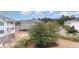 Complex of buildings with surrounding trees and parking area at 4872 Dahila Ct. # 301, Myrtle Beach, SC 29577