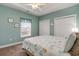 Bright bedroom with a queen-size bed and ample closet space at 4872 Dahila Ct. # 301, Myrtle Beach, SC 29577