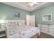 Primary bedroom with a queen bed and dresser at 4872 Dahila Ct. # 301, Myrtle Beach, SC 29577