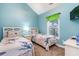 Bedroom with twin beds and dresser at 4872 Dahila Ct. # 301, Myrtle Beach, SC 29577