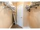 Large walk-in closet with plenty of shelving and hanging space at 4872 Dahila Ct. # 301, Myrtle Beach, SC 29577