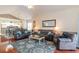 Open concept living room, kitchen and dining area with hardwood floors at 4872 Dahila Ct. # 301, Myrtle Beach, SC 29577