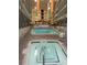 Indoor pool and hot tub area with plenty of space to relax at 5905 S Kings Highway # 2106-C, Myrtle Beach, SC 29575