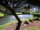 Tranquil pond with fountain and lush landscaping near building at 5905 S Kings Highway # 2106-C, Myrtle Beach, SC 29575