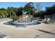 Community pool with separate area and lounge chairs at 5905 S Kings Highway # 2106-C, Myrtle Beach, SC 29575