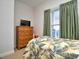 Small bedroom with a dresser, TV and full-size bed at 6203 Catalina Dr. # 1814, North Myrtle Beach, SC 29582
