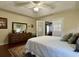 Main bedroom with a dresser and a queen-size bed at 635 Bucks Trail, Longs, SC 29568