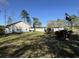 Community building with grassy area and flagpole at 635 Bucks Trail, Longs, SC 29568