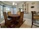 Bright dining area with a round table and four chairs, plus additional counter seating at 635 Bucks Trail, Longs, SC 29568