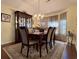 Dining room featuring a wood table and chairs, and large windows at 635 Bucks Trail, Longs, SC 29568