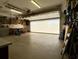Spacious garage with ample storage cabinets and workbenches at 635 Bucks Trail, Longs, SC 29568