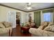 Living Room with two sofas, a coffee table, and a ceiling fan at 635 Bucks Trail, Longs, SC 29568