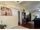 Living room with hardwood floors, a TV, and a treadmill at 635 Bucks Trail, Longs, SC 29568