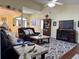 Living room with hardwood floors, fireplace, and leather furniture at 635 Bucks Trail, Longs, SC 29568