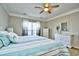 Calm bedroom with a king-size bed and neutral decor at 6425 Cascata Dr., Myrtle Beach, SC 29572