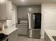 Stainless steel appliances and granite countertops in kitchen at 6605 Colonial Dr., Myrtle Beach, SC 29572