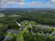 Aerial view showcasing community and pond at 663 Pinehurst Dr. # 93C, Pawleys Island, SC 29585