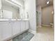 Bathroom with double vanity, large mirror, and shower at 663 Pinehurst Dr. # 93C, Pawleys Island, SC 29585