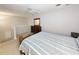 Upstairs bedroom with a comfortable bed and dresser at 663 Pinehurst Dr. # 93C, Pawleys Island, SC 29585
