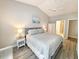 Main bedroom with king bed, dresser, and ensuite bathroom access at 663 Pinehurst Dr. # 93C, Pawleys Island, SC 29585