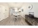 Dining area with white table and chairs near the kitchen at 663 Pinehurst Dr. # 93C, Pawleys Island, SC 29585