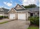 Brick front and two-car garage with landscaping at 663 Pinehurst Dr. # 93C, Pawleys Island, SC 29585