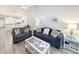 Open living room with sectional sofa and view of kitchen at 663 Pinehurst Dr. # 93C, Pawleys Island, SC 29585