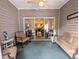 Sunroom with sliding glass doors leading to backyard at 663 Pinehurst Dr. # 93C, Pawleys Island, SC 29585