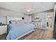 Main bedroom with queen bed, dresser, and access to bathroom at 673 Hemlock Ave., Myrtle Beach, SC 29577