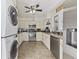 Full kitchen with stainless steel appliances and stackable washer/dryer at 673 Hemlock Ave. # 673, Myrtle Beach, SC 29577