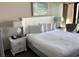 Serene bedroom with cozy bed, bedside tables, and access to ocean-view balcony with natural light at 6900 N Ocean Blvd. # 614, Myrtle Beach, SC 29572