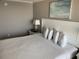 Comfortable bedroom features a neatly made bed with plush pillows and stylish decor at 6900 N Ocean Blvd. # 614, Myrtle Beach, SC 29572