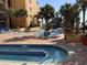 Inviting lazy river and pool area surrounded by lush palm trees and comfortable lounge chairs at 6900 N Ocean Blvd. # 614, Myrtle Beach, SC 29572