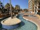 Scenic lazy river featuring clear blue water, islands with trees, and views of the resort at 6900 N Ocean Blvd. # 614, Myrtle Beach, SC 29572