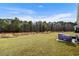 Spacious backyard with grassy area at 7015 River Bridge Ct, Myrtle Beach, SC 29579