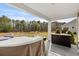 Covered patio overlooking a spacious backyard at 7015 River Bridge Ct, Myrtle Beach, SC 29579