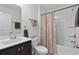 Bathroom with tub shower combination and updated vanity at 7015 River Bridge Ct, Myrtle Beach, SC 29579