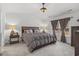 Bright bedroom with a plush bed and ample natural light at 7015 River Bridge Ct, Myrtle Beach, SC 29579