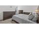 Guest bedroom with a queen-size bed and lots of storage at 7015 River Bridge Ct, Myrtle Beach, SC 29579
