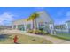 Community center with palm trees and walkway at 7015 River Bridge Ct, Myrtle Beach, SC 29579