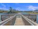 Wooden community dock providing lake access at 7015 River Bridge Ct, Myrtle Beach, SC 29579