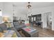 Spacious living room with sectional sofa and fireplace at 7015 River Bridge Ct, Myrtle Beach, SC 29579