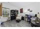 Home office featuring built-in shelving and hardwood floors at 803 B Rufus St., Conway, SC 29526