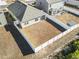 Aerial view of a house and backyard with a fence at 9179 Fort Hill Way, Myrtle Beach, SC 29579