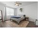 Cozy bedroom with a queen-size bed, large windows, and a tranquil atmosphere at 9179 Fort Hill Way, Myrtle Beach, SC 29579