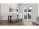 Bright dining area with sliding glass doors to patio at 9179 Fort Hill Way, Myrtle Beach, SC 29579