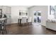 Dining area with wood table and four chairs, near kitchen at 9179 Fort Hill Way, Myrtle Beach, SC 29579