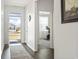Bright entryway with view into home office and hardwood floors at 9179 Fort Hill Way, Myrtle Beach, SC 29579