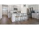 Island kitchen with stainless steel appliances and granite countertops at 9179 Fort Hill Way, Myrtle Beach, SC 29579