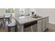 Kitchen island with granite countertops and dishwasher at 9179 Fort Hill Way, Myrtle Beach, SC 29579